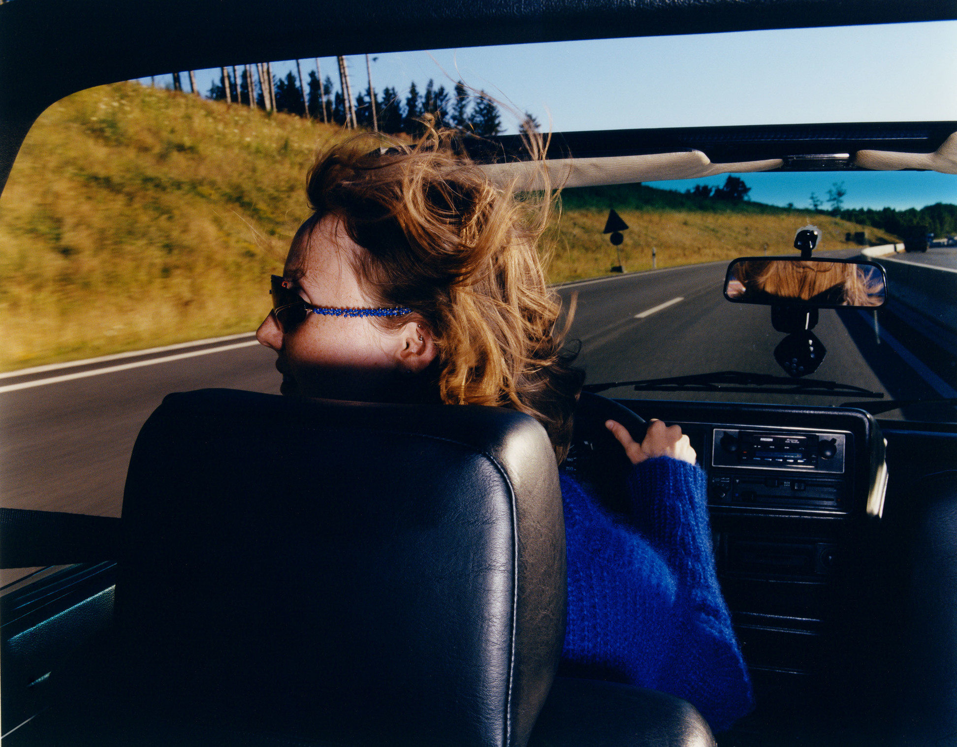 A fashion editorial photographed on the German autobahn,  shot entirely on the go. *{Styling by Samira Fricke. Casting by Affa Osman. Make up by Patrick Glatthaar. Photo assistant : William Fleming}* - © Maciek Pożoga